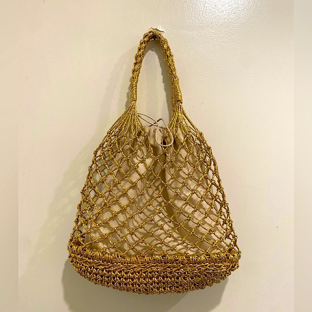 Medium size gold straw bag with canvas pocket